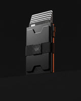 LYNK pop-up metal wallet in matte black aluminum, three-quarter view