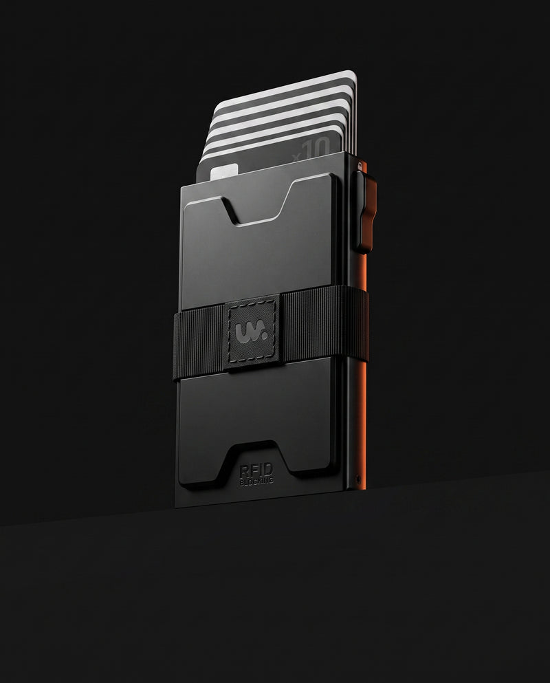 LYNK pop-up metal wallet in matte black aluminum, three-quarter view